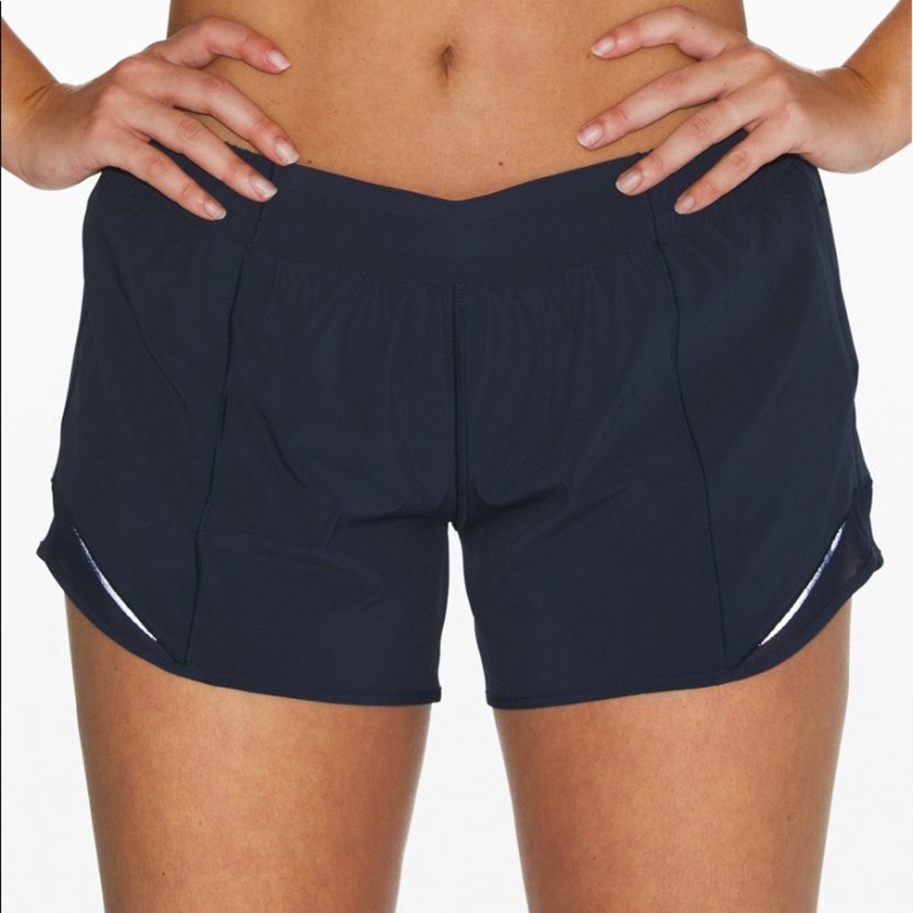 Navy blue hotty hot short. Size 4, 4” inseam.